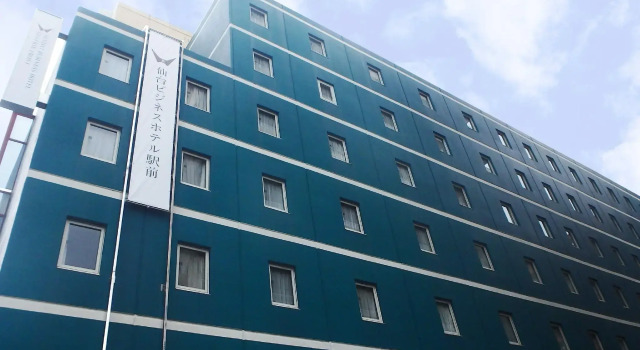 Кровать в общем номере Sendai Business Hotel Ekimae