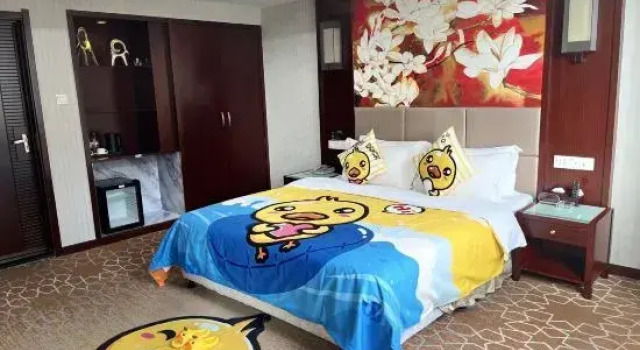 Номер Deluxe New Land Hotel