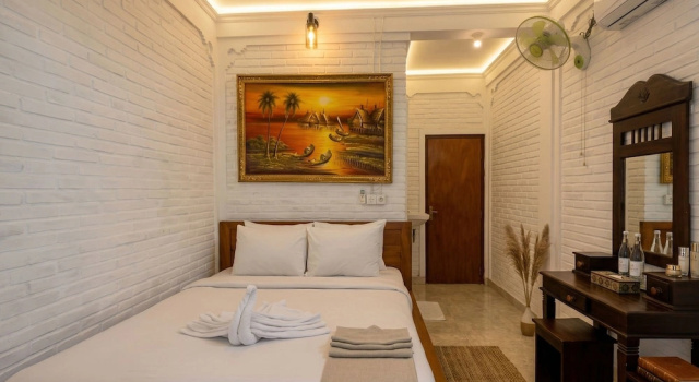 Номер Standard с балконом Rumah Rini by Rumah Weda