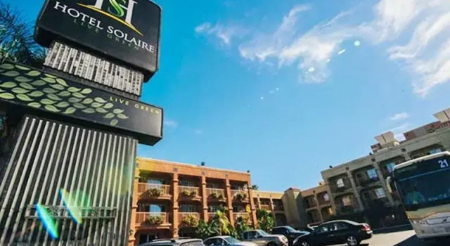 Кровать в общем номере Hotel Solaire Los Angeles
