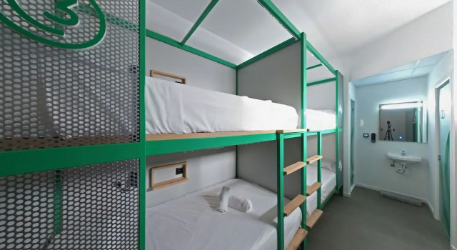 Кровать в общем номере Konk Hostel