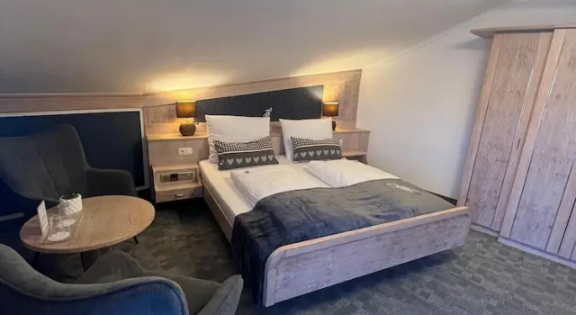 Двухместный номер Comfort с балконом и с видом на сад Hotel Quellenhof