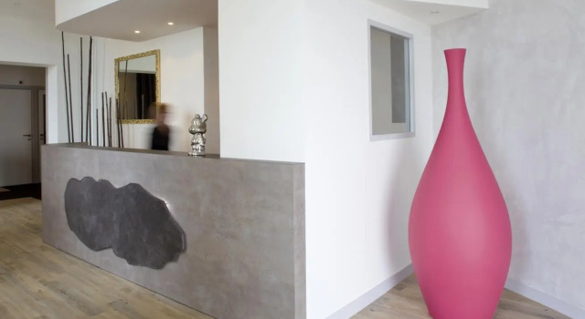 Кровать в общем номере Hotel & Spa Les Roches Noires