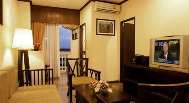 Кровать в общем номере Royal Panerai Hotel Chiangmai