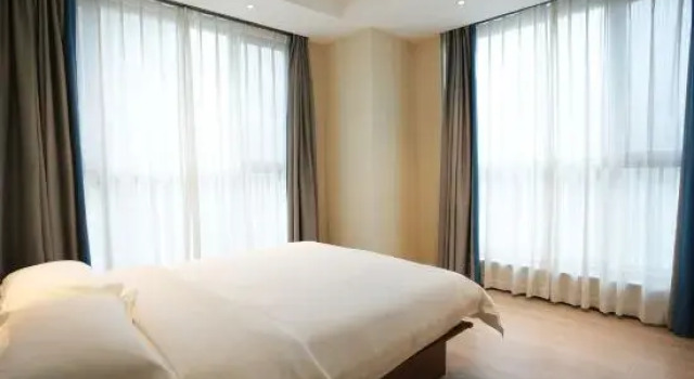 Люкс Business Jingting Holiday Apartment (Qingdao Golden Beach Resort Tangdaowan Branch)
