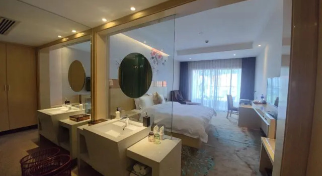 Двухместный номер Deluxe с балконом Paco Business Hotel Luo Gang Wan Da Branch