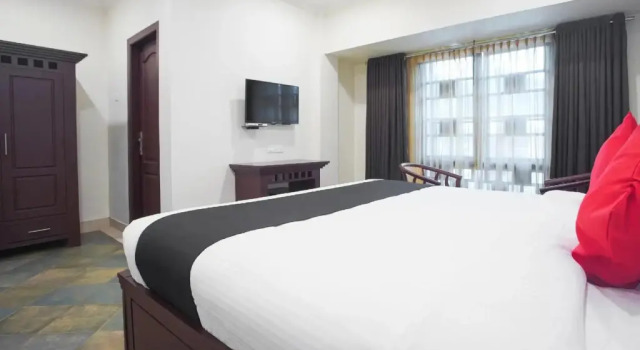 Hotel Prince by OYO Rooms, Забронировать Отель Коттаям штат Керала, рядом с Железнодорожный вокзал Коттаям