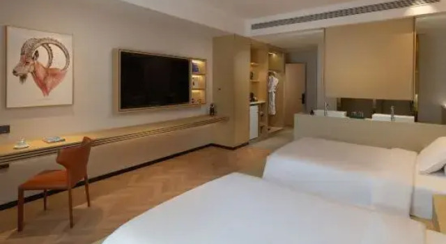 Люкс Junyang Hotel (Aksu Railway Station Old Street Night Market)