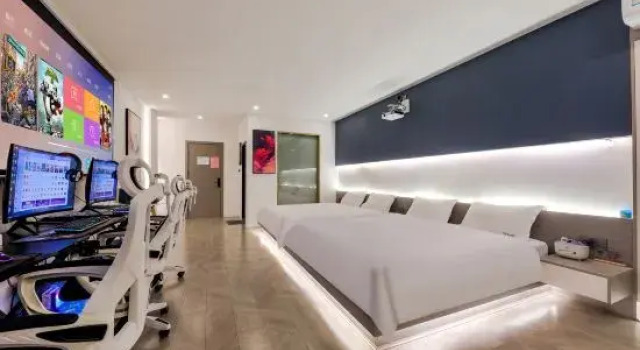 Кровать в общем номере Xingju E-Sports Hotel (Shaxian Pedestrian Street)