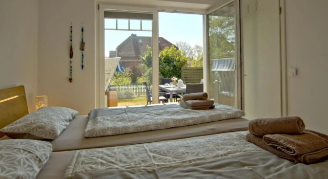 Inselparadies - Neubauwohnung mit großer Terrasse, Strandkorb und Garten, Забронировать Отель Вангероге East Frisian Islands