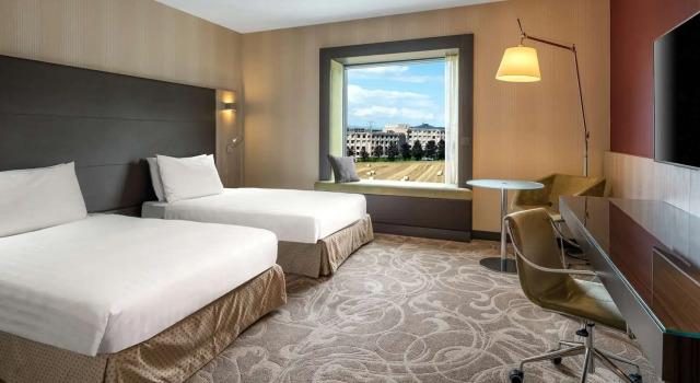 Четырёхместный номер Family Connecting Deluxe Hilton Geneva Hotel and Conference Centre