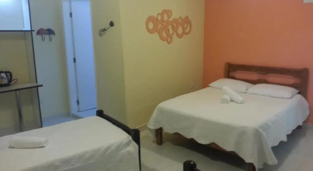 Четырёхместный номер Standard Pousada Porto Paraiso, o seu Paraíso Escondido no Guarujá