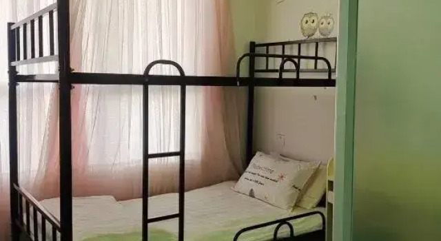 Кровать в общем номере Ruyi Hotel (Hefei Binhu Century City Shop)