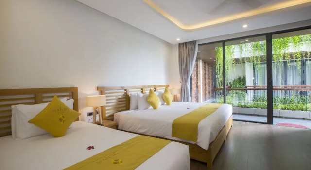 Семейный номер Standard с красивым видом из окна MaiChi Villa Hoi An