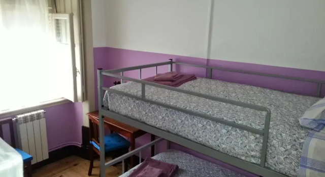 Кровать в общем номере CSI Coimbra & Guest House