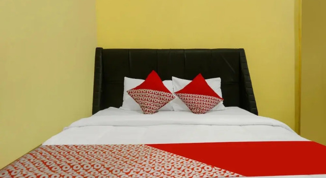 Номер Deluxe Hotel O Wisma Melyro Syariah Near Yamaha - Thamrin Brothers Cabang Muara Dua