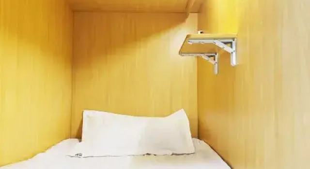 Кровать в общем номере Zhuanshan International Youth Hostel (Jiaxiu Lou Qingyun Market)