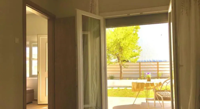 Апартаменты Lovely House by the Sea with Garden and BBQ (A)