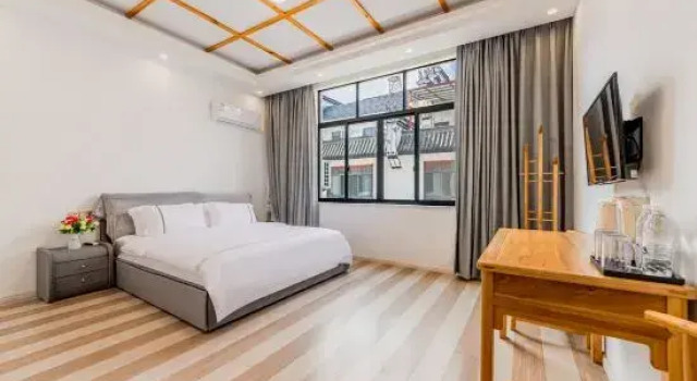 Кровать в общем номере Zeyuan Homestay