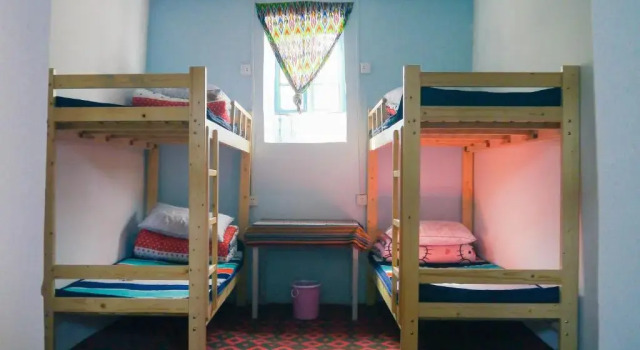 Кровать в общем номере Turpan Dap Youth Hostel