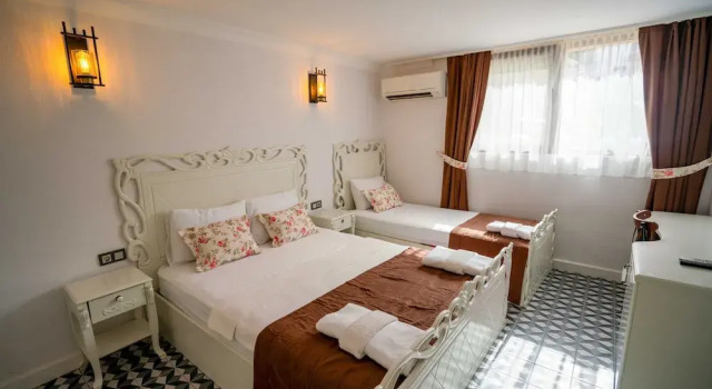 Трёхместный семейный номер Standard Cunda Pusula by Megaron Homes