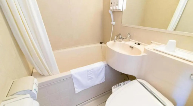 Одноместный номер Economy Toyoko Inn Hokkaido Sapporo-eki Nishi-guchi Hokudai Mae