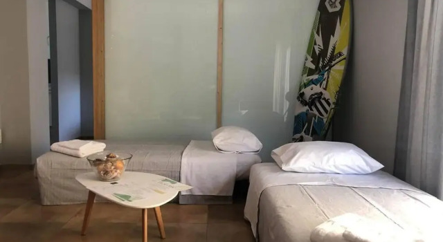 A Cozy Summer Retreat in the Woods of Rhodes