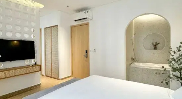 Люкс Deluxe Mộc Homestay GrandWorld Phú Quốc