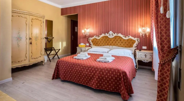 Четырёхместный номер Standard B&B La Bauta