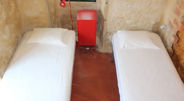 Кровать в общем номере Pereira Cabana
