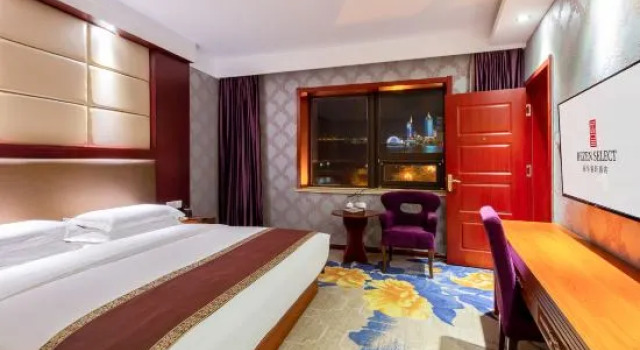 Люкс Deluxe Qingdao Huaneng Hotel