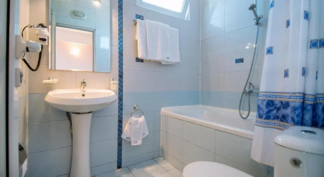 Апартаменты Vromos Guest Rooms