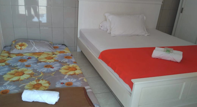 Номер Deluxe Ratu Guesthouse