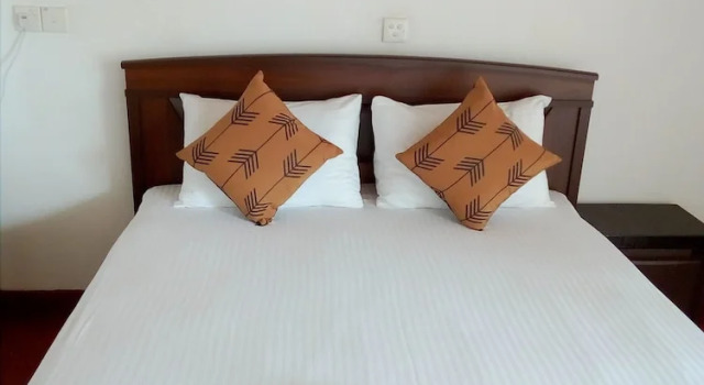 Номер Deluxe New SeaSide Inn Hikkaduwa