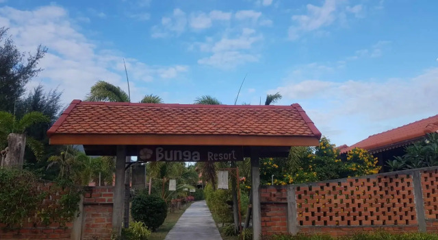 Кровать в общем номере Bu-Nga Resort