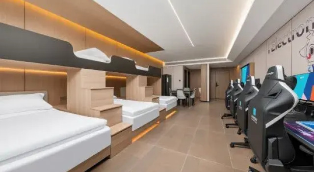 Кровать в общем номере IDJ E-Sports Hotel (Tongling Beidouxing Cheng)
