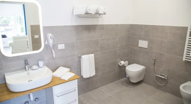 Апартаменты Comfort Rivabella Suite Apartments