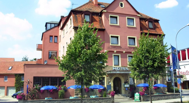 Кровать в общем номере Hotel Rothenburger Hof