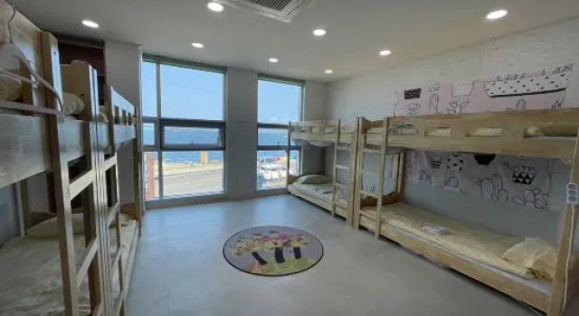 Кровать в общем номере (женский номер) Jeju Airport Guesthouse Yesjun
