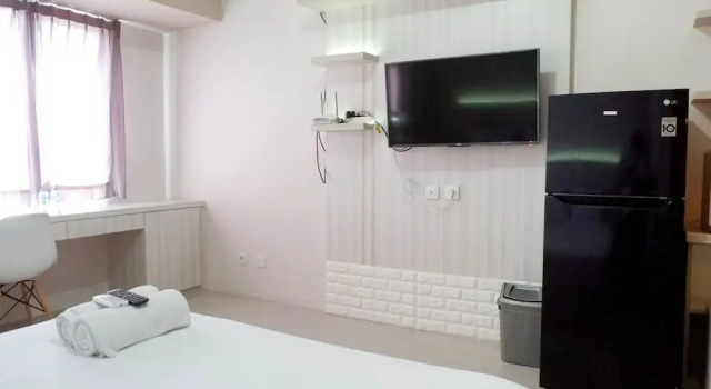 Апартаменты Spacious Studio Apartment Accses To Pakuwon Mall At Tanglin Supermall Mansion