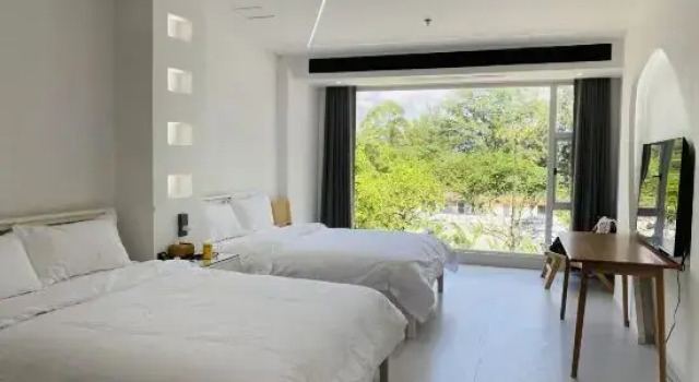 Трёхместный люкс Deluxe Dongxing City Wanwei golden Beach qulang resorts