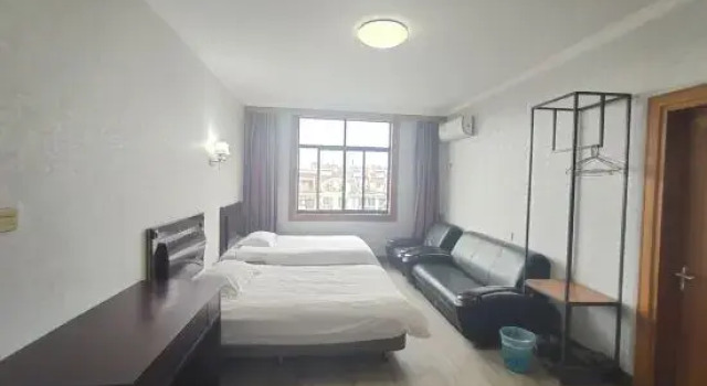 Семейный люкс Jinqiao Hotel
