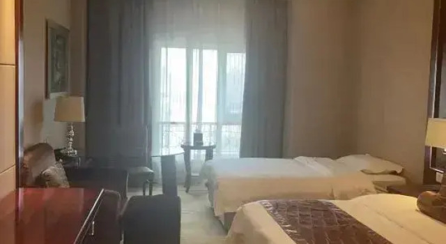 Номер Deluxe Qingdao Huaxi Hotel