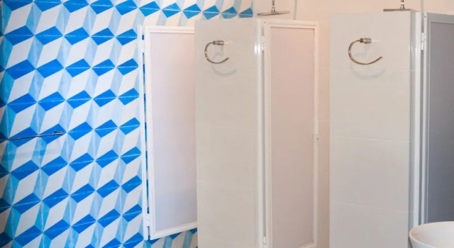 Кровать в общем номере Hostal Nacional