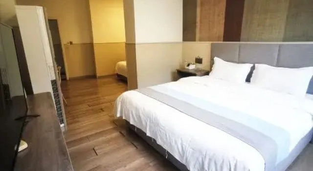 Двухместный люкс Aishang City Inn