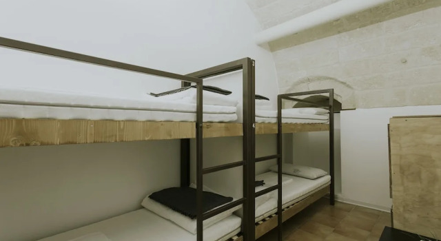 2 slaapkamers Bed in slaapzaal Ostello dei Sassi Matera