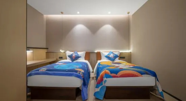 Семейный люкс GINLAN JIA Chongwen Impression Hotel (Nantong University Town Yuanyong Plaza)