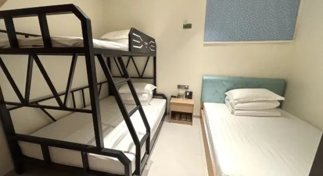 Трёхместный люкс Jiuhouxuan Hotel