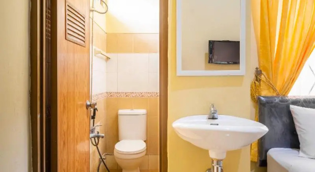 Номер Standard RedDoorz Syariah at Bumi Eyang Enin Homestay Tasikmalaya