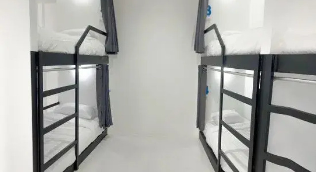 Кровать в общем номере Krabi Grand Place Hotel